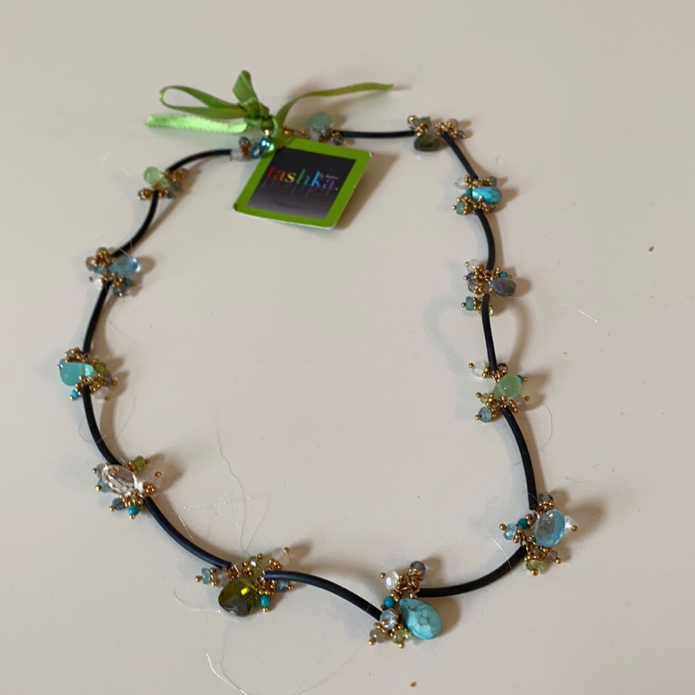 Semi precious stone necklace on black leather